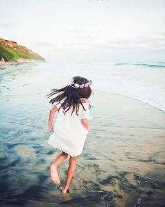Wildflower Studio Photography, www.wildflowerstudiophoto.com/blog, Photo Shoot, Northern California, Southern California, twirling, dress, child, little girl, beach, flower crown, ocean, sand, fun, summertime